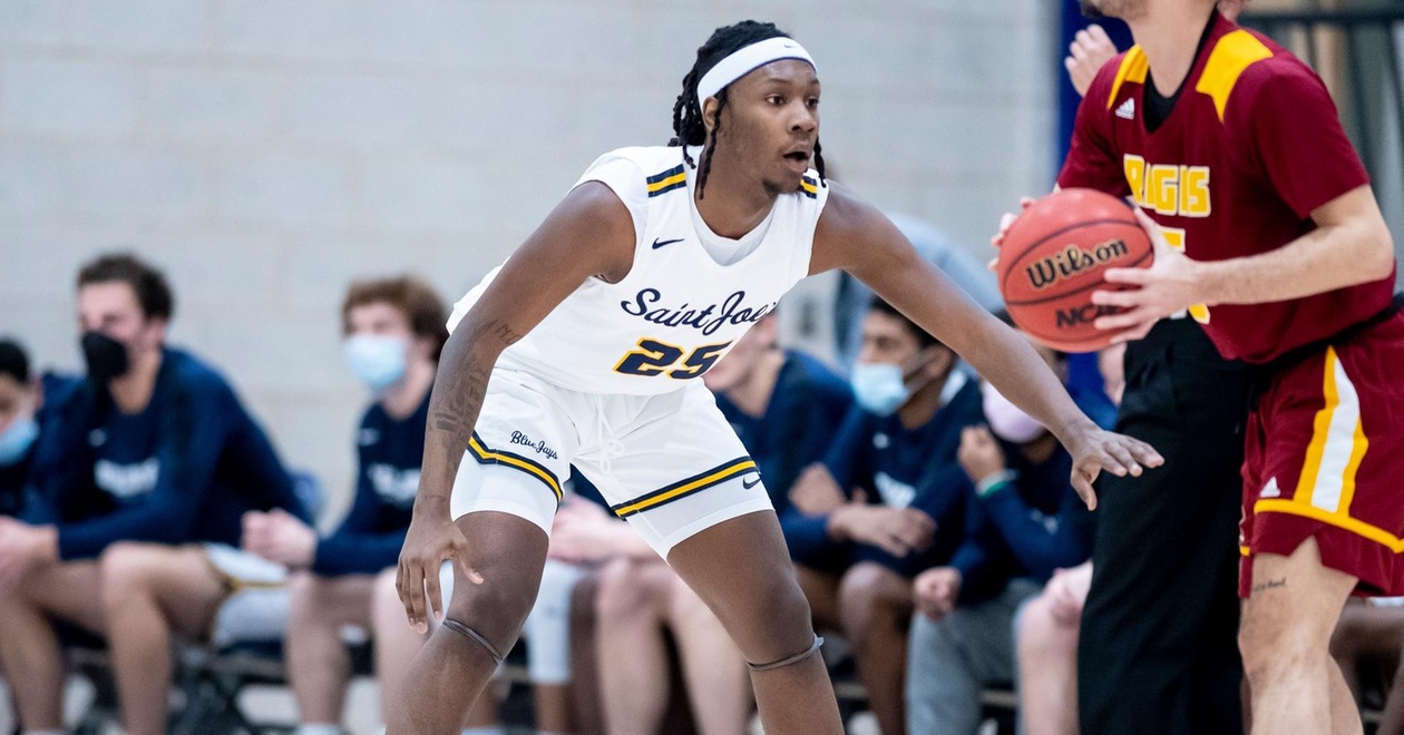 No. 9 Men's Basketball Rolls At Regis Sunday Night, 81-56