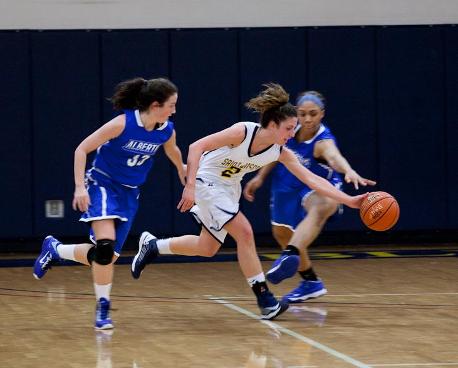 Basketball Opens with Win